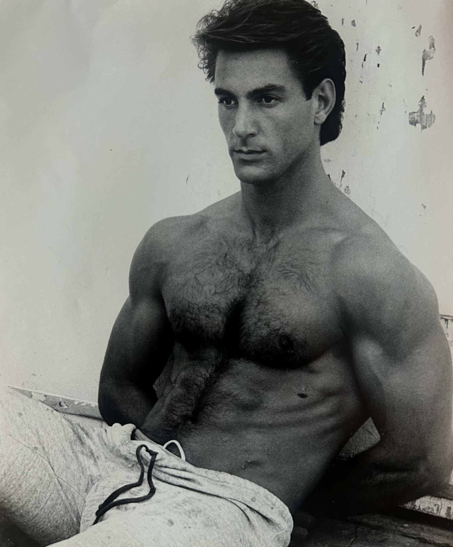 Black and white modelling photograph of a muscular torso